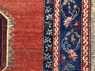 Antique large Caucasian rug with some unusual features. Although presumably Kazak, possibly Armenian, with Lori Pombak medallions. The rug has unusually open drawing and is fitted with a very  delicate floral  ...