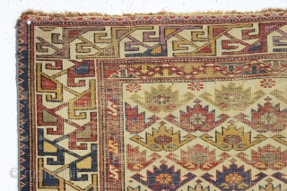 antique ivory ground east caucasian rug with a charming and very unusual design. Probably shirvan. "as found", quite dirty, with scattered wear as shown and some minor edge loss all around. Although  ...