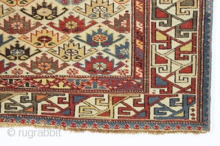 antique ivory ground east caucasian rug with a charming and very unusual design. Probably shirvan. "as found", quite dirty, with scattered wear as shown and some minor edge loss all around. Although  ...