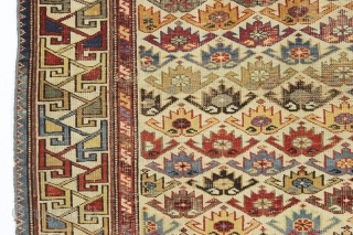 antique ivory ground east caucasian rug with a charming and very unusual design. Probably shirvan. "as found", quite dirty, with scattered wear as shown and some minor edge loss all around. Although  ...