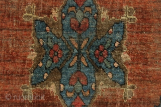Is it a butterfly? is it a flower? it's supermat. Not really, but an unusual little south persian mat. Interesting medallion and an earthy palette with uneven abrashed field. Lots of natural  ...