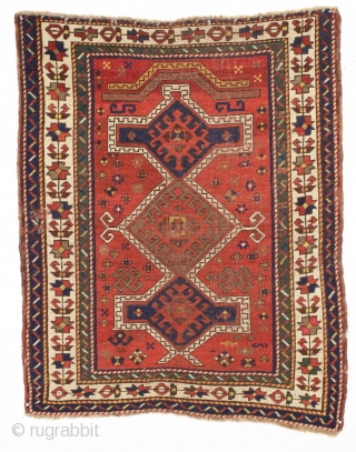 antique small kazak prayer rug with an unusual pair of floating arches. I've never had one like it. Overall fair condition for the age with all natural colors. And yes the orange  ...