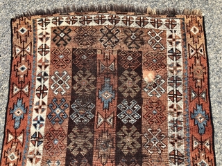 Antique Caucasian rug with dark goat hair warps, likely Zakatala. Bold large scale drawing. Interesting all natural color palette. Overall low pile. Selvages not original. End loss. Faded out small old patch  ...