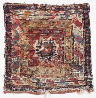 Antique large sumak bagface. Terrific borders. All natural colors with nice yellows and greens. Some cotton whites. Old crude off colored but oddly well done large home repair of lower field. Small  ...