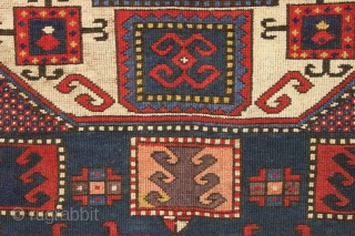 early blue ground karachopf kazak. Classic overall form but some unusual and idiosyncratic elements and colors. Interesting border drawing. All natural colors including a good old purple, nice clear yellows and a  ...