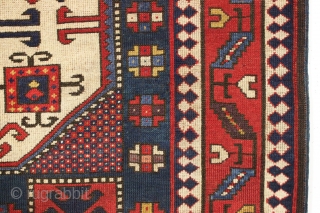 early blue ground karachopf kazak. Classic overall form but some unusual and idiosyncratic elements and colors. Interesting border drawing. All natural colors including a good old purple, nice clear yellows and a  ...