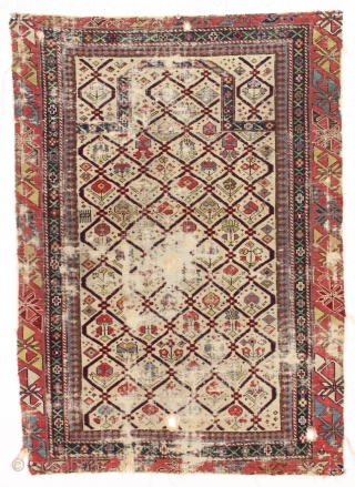 early ivory ground east caucasian prayer rug with some silk pile. What remains of an early example of the type. Interesting study piece. Hard to find this age anymore. Ca. first half  ...