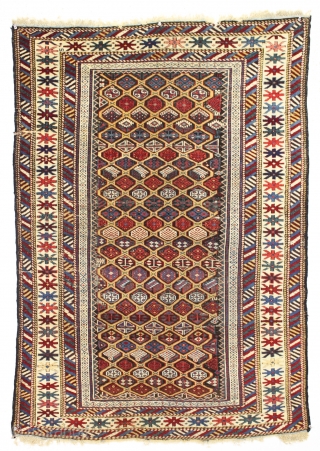 antique gold ground caucasian kuba rug. Good overall condition for a real antique example. Even low pile with heavily oxidized browns. All natural colors. Recent wash. Lovely old unrestored rug with good  ...