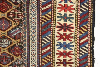 antique gold ground caucasian kuba rug. Good overall condition for a real antique example. Even low pile with heavily oxidized browns. All natural colors. Recent wash. Lovely old unrestored rug with good  ...