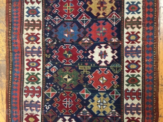 Antique runner with a terrific field design and an even better border. Caucasian? Shahsavsn? Beautiful colors featuring lovely greens and strong clear yellows. Washed and restored to near original condition. Not something  ...