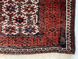 Antique small Baluch rug in reasonably good condition with an unusual field design. The overall lattice field with offset rows of delicate flowers I have not seen before. Nice floppy handle. Scattered  ...