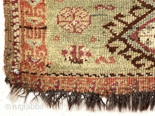 Antique little east Anatolian Kurdish yastik with goat hair warps and pretty green ground. Classic medallion design field. Fair condition, some wear to foundation. As found, dirty, in need of a good  ...