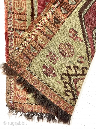 Antique little east Anatolian Kurdish yastik with goat hair warps and pretty green ground. Classic medallion design field. Fair condition, some wear to foundation. As found, dirty, in need of a good  ...