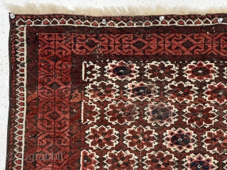 Antique small Baluch rug in reasonably good condition with an unusual field design. The overall lattice field with offset rows of delicate flowers I have not seen before. Nice floppy handle. Scattered  ...