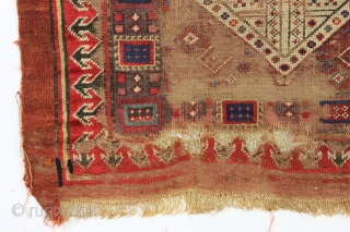 early nw persian rug with eye catching drawing and beautiful old colors. Multiple reds, light blues and a fine old purple. Complete but very much abused with areas of heavy wear and  ...