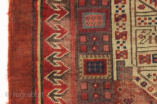 early nw persian rug with eye catching drawing and beautiful old colors. Multiple reds, light blues and a fine old purple. Complete but very much abused with areas of heavy wear and  ...