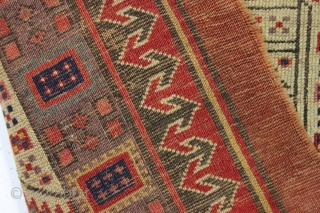 early nw persian rug with eye catching drawing and beautiful old colors. Multiple reds, light blues and a fine old purple. Complete but very much abused with areas of heavy wear and  ...