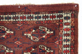 antique yomud chuval. Bold and colorful insect border All natural colors. lovely medium blues. Good pile. Reasonably clean. No repairs. 19th c. 32"          