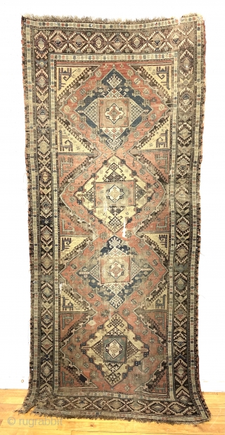 Antique soumak long rug. Early example of a so-called “akstafa soumak” type. More or less intact but obviously abused with scattered abrasions and small tears. Structurally sound. Good old natural colors with  ...