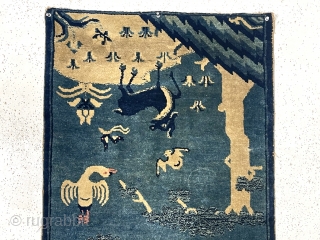 Outstanding diminutive antique Chinese rug. Great double landscaping fantasy with charming flora and fauna. My assumption this weaving is meant to be hung over a chair back or some similar furniture to  ...