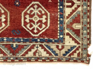 Antique bordjalou Kazak prayer rug. Attractive reasonably early example with spacious drawing. All natural colors. Overall even low pile. Small corner edge gouge and I see a small tear/hole probably old moth.  ...