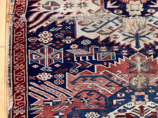 Antique zejwa kuba rug. Heavy wear and scattered damage as shown, priced accordingly. Good colors. Some interesting elements. 19th c. 
3’6” x 6’3”
          
