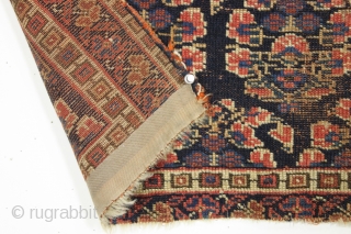 Antique afshar bagface. Older piece with an attractive unusual border. All natural colors. Thin and floppy. Some wear and edge damage as shown. ca. 1880 or earlier. 17" x 28"   