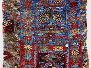 Early east Anatolian Kurdish pile rug fragment. Splendid natural colors with saturation rarely found outside these beautiful weavings. Good fleecy pile with scattered wear, holes, tears and brown oxidation. Edges unraveling. Remnant  ...