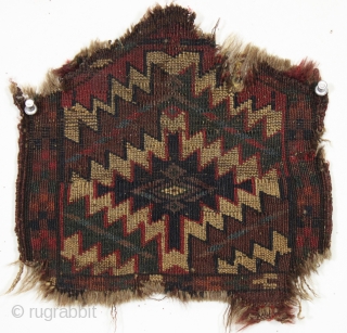 Antique tiny turkoman weaving. All good old natural colors. Not sure exactly how it was used but it's the oldest one I've seen. ca. 1875 or earlier. 9" x 10" 
  