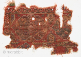 Early fragment of a Turkish rug. ca. 1800 or earlier. 12" x 18"                    