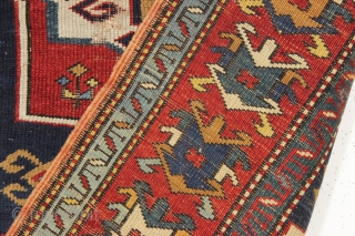 antique small kazak prayer rug. Unusual field ornamentation and a striking light blue border. If palmettes are your thing this is the rug for you. All natural colors including an unusual yellow/gold.  ...