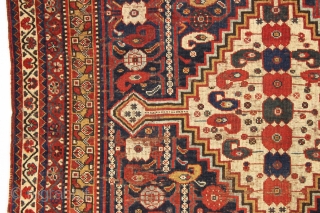 antique little south persian rug in good condition with a very interesting design. An unusual combination of allover field elements and a dramatic ivory medallion. All well saturated natural colors and good  ...