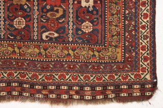 antique little south persian rug in good condition with a very interesting design. An unusual combination of allover field elements and a dramatic ivory medallion. All well saturated natural colors and good  ...