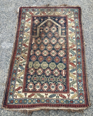 Antique Caucasian prayer rug with chi  chi type design. As found, very dirty. All good natural colors. Very low pile with wear as shown. Few small old crude repairs. Remnant original  ...