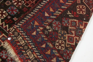 Antique south persian bagface. Unusual natural brown ground. All natural colors. Pretty good pile with a few small holes (6 holes and a gouge). Good repair project. Reasonably clean. 19th c. weaving  ...