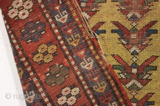 Antique small yellow ground kazak prayer rug. Interesting design. All natural colors.  "As found", very dirty with wear and damage as shown. Priced accordingly. Good age, ca. 3rd qtr. 19th c.  ...