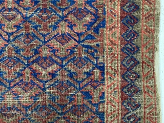 Antique blue ground Baluch prayer rug with shrub lattice. Unusual hand panel design with mini boteh. Nice original wide flat woven ends and original selvages. Overall fair condition for the age with  ...