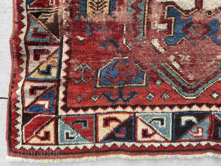 Antique STAR KAZAK. Sorry, no, but truly  an antique Caucasian rug with an iconic Star Kazak border. Cheerful and colorful with wear and scattered old repiling. 3’8” x 6’3”   