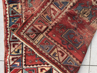Antique STAR KAZAK. Sorry, no, but truly  an antique Caucasian rug with an iconic Star Kazak border. Cheerful and colorful with wear and scattered old repiling. 3’8” x 6’3”   