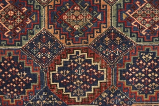 antique kuba rug with an unusually large variety of designs in the field. The overall effect is of great delicacy and i don't think one could fit in much more. Overall pretty  ...