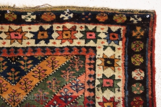 antique kurdish rug in good condition with a bold design and superb colors. Genuine old rug from a New England home. Overall fleecy wool and thick good pile with only slight wear.  ...