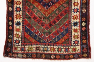 antique kurdish rug in good condition with a bold design and superb colors. Genuine old rug from a New England home. Overall fleecy wool and thick good pile with only slight wear.  ...