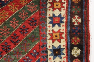 antique kurdish rug in good condition with a bold design and superb colors. Genuine old rug from a New England home. Overall fleecy wool and thick good pile with only slight wear.  ...