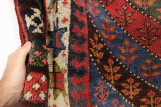 antique kurdish rug in good condition with a bold design and superb colors. Genuine old rug from a New England home. Overall fleecy wool and thick good pile with only slight wear.  ...