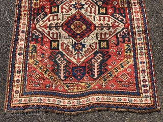 Antique Caucasian karrabagh rug, a type often described as “Kasim Ushak”. This reasonably early example has the characteristic medallions and serrated leaf motifs plus many interesting tribal decorations of humans and animals.  ...