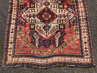 Antique Caucasian karrabagh rug, a type often described as “Kasim Ushak”. This reasonably early example has the characteristic medallions and serrated leaf motifs plus many interesting tribal decorations of humans and animals.  ...