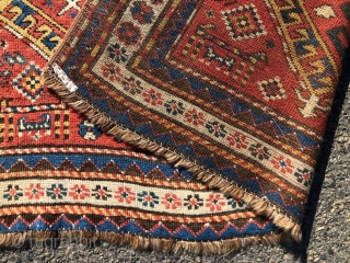 Antique Caucasian karrabagh rug, a type often described as “Kasim Ushak”. This reasonably early example has the characteristic medallions and serrated leaf motifs plus many interesting tribal decorations of humans and animals.  ...