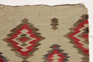 old small navajo rug with an interesting design and overall fair condition. "as found", dirty but still floppy handle and I see a small hole or two barely showing. No color run.  ...