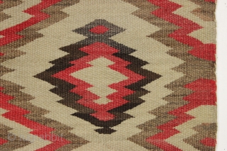 old small navajo rug with an interesting design and overall fair condition. "as found", dirty but still floppy handle and I see a small hole or two barely showing. No color run.  ...