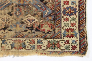 antique little east caucasian rug, probably best described as seichour, with an unusual variation of the bijov design. The light blue wing like medallions are hard to ignore. "as found", very dirty  ...